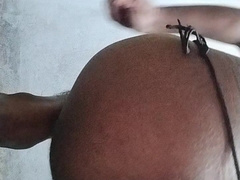 Rubbing dick with oil