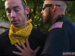 Beautiful boy joins in on a massive orgy with his bisexual partner & their police buddies