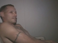 Adventurous tattooed guy indulges in anonymous glory hole blowjobs during lunch break