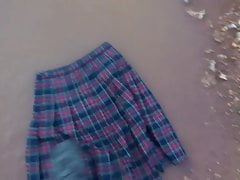 red tartan skirt in mud puddles