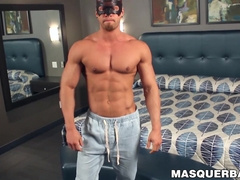 Macho muscular dude Brad with a mask on his face jacks off