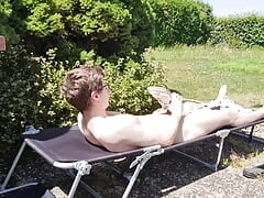 Young Nike Boy has fun outdoors and squirts