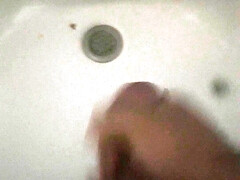 Jerking in the bathroom sink
