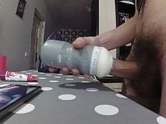 masturbating with a masturbator on an ironing board