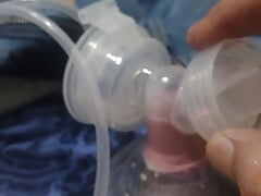 Milking tiny dick with breast pump