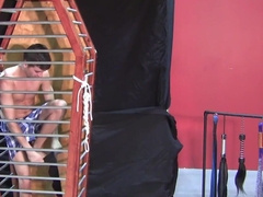 Caged boy lets his horny master play the kinkiest games with him