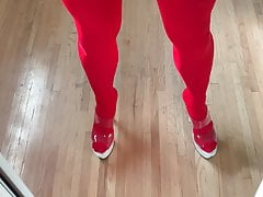 Mirror cum in red tights, stockings and heels