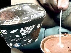 Black man jerking off black cock to massive cum load in ice cream