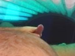 jacking off in tanning bed