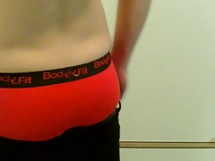 sagging black slim jeans in red boxerbriefs
