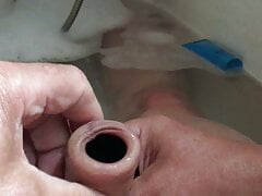 Foreskin stretching in the bath: two items